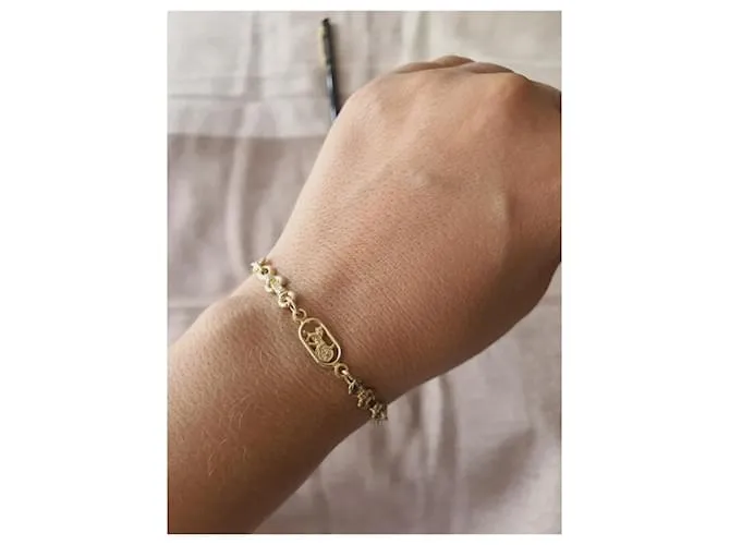 Céline Brazalete Celine vintage Dorado 