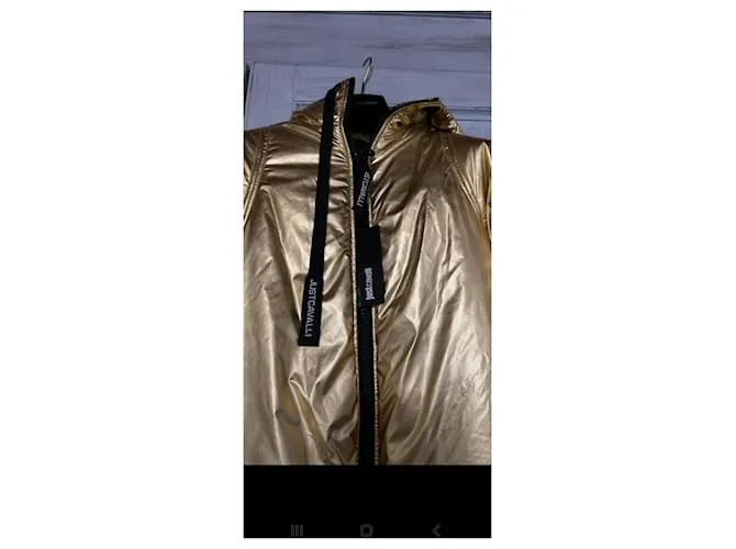 Roberto Cavalli Chaqueta acolchada larga Negro Dorado 