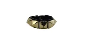 Valentino Garavani Brazalete Rockstuds grande de oro negro Valentino 